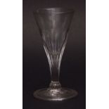 Small conical half fluted wine glass, spreading circular foot, 11 1/2cms high