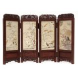 Chinese miniature hardwood framed table screen of four folds, each with intricate silk