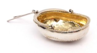 Early 19th century Russian silver parcel gilt tea strainer, modelled in the form of a basket with