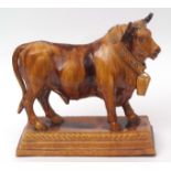 Portuguese Caldas pottery brown glazed Palissy type model of a bull on a rectangular plinth with