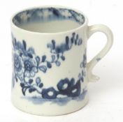 Lowestoft coffee can, circa 1770, with a blue and white design of trailing flowers, butterfly to the