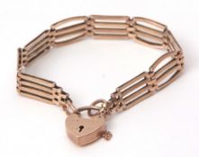 9ct stamped four-bar gate bracelet, padlock and safety chain fitting, 13 1/2gms