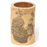 Japanese ivory brush pot or vase finely carved with courtesans in a garden setting with gold lacquer