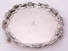 Edward VII salver of shaped circular form with cast and applied C-scroll and shell border to a