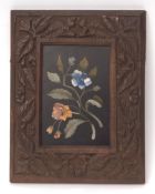 Oak framed pietra dura picture depicting sprigs of foliage, 27 x 21cms