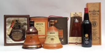 Bell's 12yo Old Scotch Whisky, two decanters in circular cartons, Bell's Millennium 2000 8yo