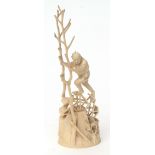 Japanese ivory Okimono of a farmer treading a waterwheel, 23cms high