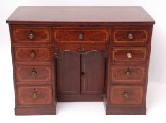 19th century mahogany twin pedestal desk, the cross-banded and strung and inlaid top over a