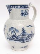 Impressive large Lowestoft jug, the body moulded with flower heads, decorated in underglaze blue