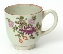 Lowestoft coffee cup, circa 1770, decorated in polychrome with a cornucopia and floral sprays