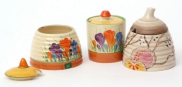 Collection of beehives and jam jars including two with Crocus pattern, the third with branches on