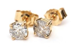 Pair of brilliant cut diamond single stone stud earrings, 1.04ct approx, post fittings, stamped 750
