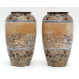 Pair of early 20th century Royal Doulton vases by Hannah Barlow and Florence Roberts with tube lined