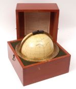 Second quarter of 20th century star globe, the square case with pull off cover and set with