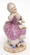 19th century Meissen model of a young girl seated reading a book, impressed numerals and crossed