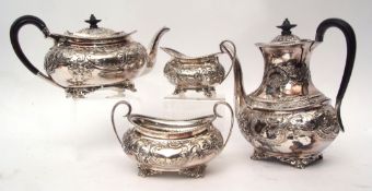 Late Victorian four piece tea and coffee service comprising tea pot, coffee pot, sugar basin and