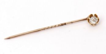 Early 20th century diamond set stick pin, the finial claw set with an old cut diamond, 0.33ct