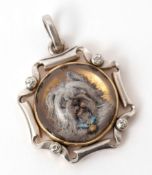 Precious metal carved and painted vintage intaglio glass terrier dog pendant, the pierced scroll