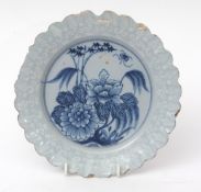 Bristol Delft plate decorated with flowers within a Bianco Sopra Bianco border, 22cms diam