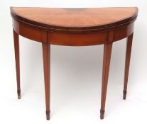 Early 19th century satinwood mahogany and rosewood cross-banded demi-lune card table lifting top