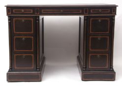 Early 19th century ebonised twin pedestal desk, stamped "Hampton & Sons, Upholsters, 8 Pall Mall