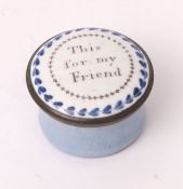19th century enamelled pill pot, the circular pull off cover with blue floral border enclosing motif