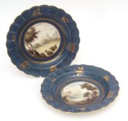 Pair of Worcester plates with named views, one of a castle, and the other of Abbey Neath, both