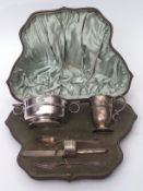 Victorian comprehensive christening set comprising a two-handled bowl of polished circular form with