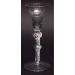 18th century wine glass with balustroid latticinio air twist stem, spreading circular foot, 16cms