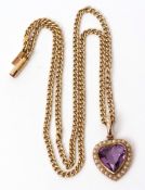 Amethyst and seed pearl pendant, the heart shaped faceted amethyst set within a surround of small