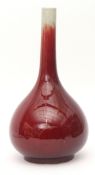 Chinese sang de boeuf flambe glazed bottle vase, 41cms high