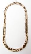Modern 9ct gold necklace, "V" shaped articulate links, stamped Italy, 38.8gms, 210mm long (fastened)