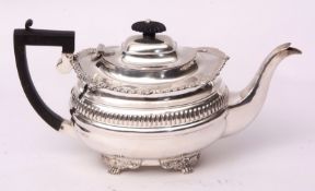 Edward VII tea pot of oval form with hinged and domed cover, cast and applied flared rim and