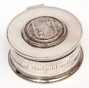 George V commemorative lidded circular box, the hinged cover with applied crest and motto of The