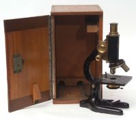 Early 20th century black finished and lacquered brass monocular microscope, C Baker - London, 11244,