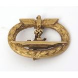 Mid-20th century German U-boat/submarine gilt brass brooch badge, Schwerin, Berlin, 68, of oval form