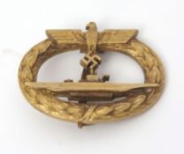 Mid-20th century German U-boat/submarine gilt brass brooch badge, Schwerin, Berlin, 68, of oval form