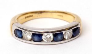 Precious metal diamond and sapphire ring, having three brilliant cut diamonds between four alternate