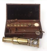 Mid-19th century lacquered brass large drum microscope of typical form with sliding tube and screw