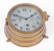 Mid-20th century German lacquered brass Kriegsmarine issued bulkhead timepiece, the drum shaped case