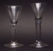 Two late 18th/early 19th century conical wine glasses, plain form, one with air drop stem, 15 and 16