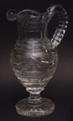 19th century, probably Irish, lead crystal large water jug, heavily faceted and with waisted support