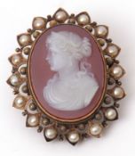 Antique hardstone cameo brooch circa 1860, the carved oval cameo depicting head and shoulders