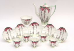 Shelley part tea set in Queen Anne shape, with a stylised Art Deco landscape printed in