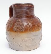 Late 18th century Mortlake (Kishere) jug decorated in tones of grey and brown with orange peel