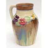 Large Clarice Cliff Isis vase, with single handle, decorated with pansies, on a ribbed ground, 30cms