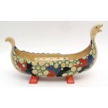 Clarice Cliff flower holder modelled as a Viking longboat with flower holder to interior, the boat