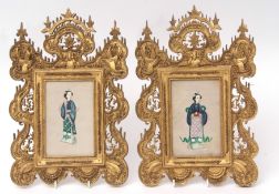 Pair of Chinese watercolours of noble women within carved giltwood frames, 36cms high overall