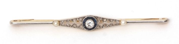 Precious metal Art Deco diamond and sapphire bar brooch, the brilliant cut centre diamond 0.20ct