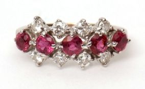 Ruby and diamond cluster ring, having a line of five circular cut rubies raised between two rows